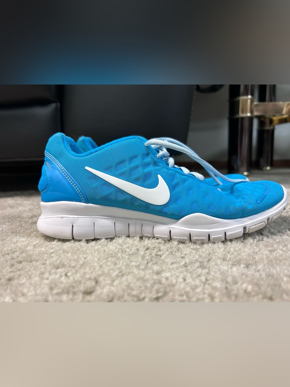 Nike womens Bright Blue Mesh Sneaker with White Swoosh